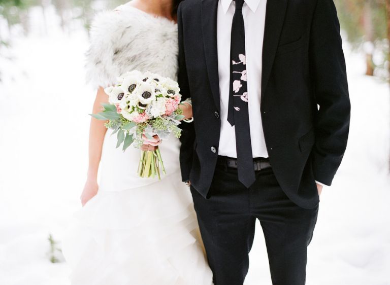 Bride and groom in snow 